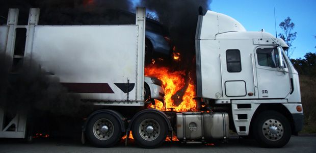 Photo of a semi truck on fire